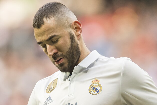 MADRID, SPAIN - JANUARY 21: Karim Benzema of Real Madrid reacts during their La Liga 2016-17 match between Real Madrid and Malaga CF at the Estadio Santiago Bernabéu on 21 January 2017 in Madrid, Spain. (Photo by Power Sport Images/Getty Images)