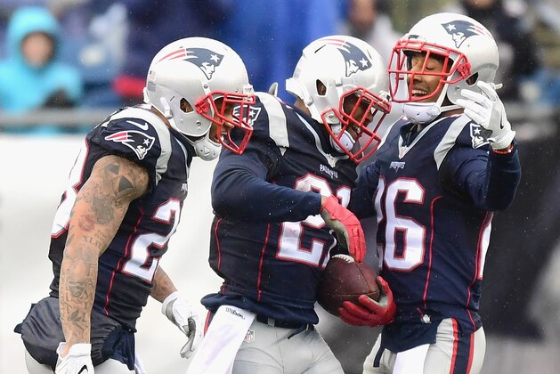 FOXBORO, MA - DECEMBER 24:  Malcolm Butler #21 of the New England Patriots reacts with Patrick Chung #23 and Logan Ryan #26 after recovering a fumble during the second quarter of a game against the New York Jets at Gillette Stadium on December 24, 2016 in Foxboro, Massachusetts.  (Photo by Billie Weiss/Getty Images)