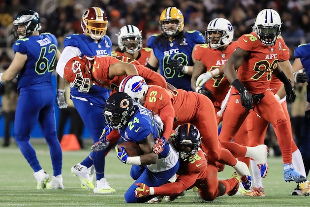 ORLANDO, FL - JANUARY 29:  Jordan Howard #24 of the NFC is tackled in the fist half by the AFC during the NFL Pro Bowl at the Orlando Citrus Bowl on January 29, 2017 in Orlando, Florida.  (Photo by Sam Greenwood/Getty Images)
