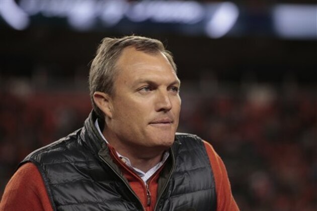 Former Denver Broncos' John Lynch speaks after being inducted into the Broncos ring of honor at half time of an NFL football game against the Houston Texans, Monday, Oct. 24, 2016, in Denver. (AP Photo/Joe Mahoney)