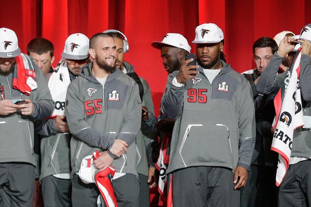 HOUSTON, TX - JANUARY 30:  Paul Worrilow #55 and Jonathan Babineaux #95 of the Atlanta Falcons stand on stage during Super Bowl 51 Opening Night at Minute Maid Park on January 30, 2017 in Houston, Texas.  (Photo by Bob Levey/Getty Images)