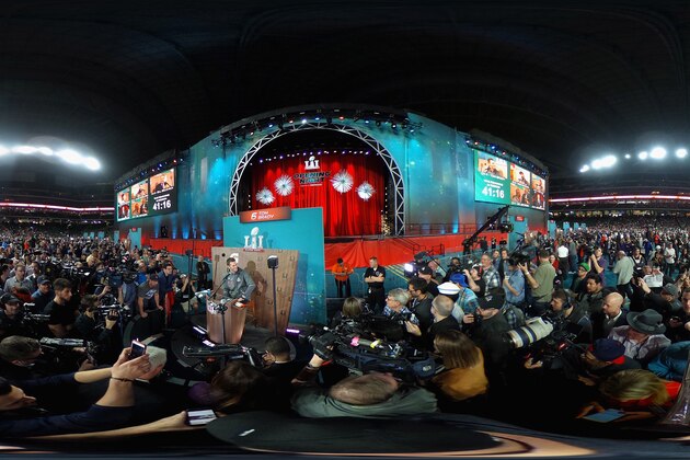 HOUSTON, TX - JANUARY 30:  (EDITOR'S NOTE: Image was created as an Equirectangular Panorama. Import image into a panoramic player to create an interactive 360 degree view.) Tom Brady #12 of the New England Patriots speaks with the media during Super Bowl 51 Opening Night at Minute Maid Park on January 30, 2017 in Houston, Texas.  (Photo by Travis Lindquist/Getty Images)