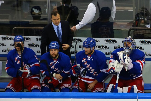 NEW YORK, NY - MAY 29:  Head coach Alain Vigneault (Top) and Henrik Lundqvist (R) #30 of the New York Rangers look on from the bench late in the third period against the Tampa Bay Lightning in Game Seven of the Eastern Conference Finals during the 2015 NHL Stanley Cup Playoffs at Madison Square Garden on May 29, 2015 in New York City.  (Photo by Elsa/Getty Images)