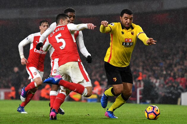 LONDON, ENGLAND - JANUARY 31: Troy Deeney of Watford takes on Gabriel of Arsenal during the Premier League match between Arsenal and Watford at Emirates Stadium on January 31, 2017 in London, England. (Photo by Mike Hewitt/Getty Images) LONDON, ENGLAND - JANUARY 31: Troy Deeney of Watford takes on Gabriel of Arsenal during the Premier League match between Arsenal and Watford at Emirates Stadium on January 31, 2017 in London, England. (Photo by Mike Hewitt/Getty Images)