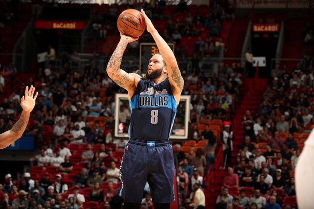 MIAMI, FL - JANUARY 19: Deron Williams #8 of the Dallas Mavericks shoots the ball during the game against the Miami Heat on January 19, 2017 at AmericanAirlines Arena in Miami, Florida. NOTE TO USER: User expressly acknowledges and agrees that, by downloading and or using this Photograph, user is consenting to the terms and conditions of the Getty Images License Agreement. Mandatory Copyright Notice: Copyright 2017 NBAE (Photo by Issac Baldizon/NBAE via Getty Images)