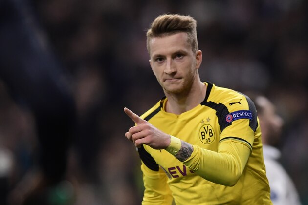 Dortmund's midfielder Marco Reus celebrates a goal during the UEFA Champions League football match Real Madrid CF vs Borussia Dortmund at the Santiago Bernabeu stadium in Madrid on December 7, 2016. / AFP / JAVIER SORIANO        (Photo credit should read JAVIER SORIANO/AFP/Getty Images)