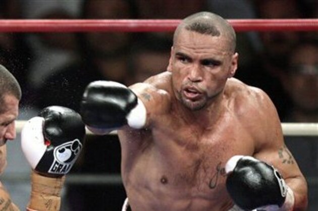 Anthony Mundine, right, defends his WBA super middleweight title against Nader Hamdan at Sydney's Entertainment Centre, Wednesday, Feb. 27, 2008. (AP Photo/Rick Rycroft)