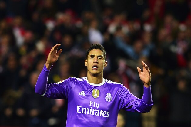 Real Madrid's French defender Raphael Varane gestures during the Spanish league football match Sevilla FC vs Real Madrid CF at the Ramon Sanchez Pizjuan stadium in Sevilla on January 15, 2017.
Sevilla won 2-1. / AFP / CRISTINA QUICLER        (Photo credit should read CRISTINA QUICLER/AFP/Getty Images)