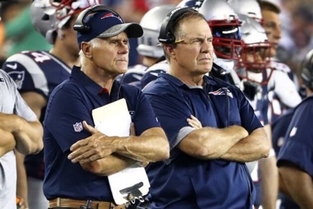 New England Patriots head coach Bill Belichick and offensive line coach Dante Scarnecchia, left, during a preseason NFL football game against the New Orleans Saints Thursday, Aug. 11, 2016, in Foxborough, Mass. The Patriots won 34-22. (AP Photo/Winslow Townson)