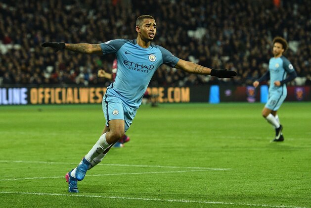 Manchester City's Brazilian striker Gabriel Jesus celebrates scoring his team's third goal during the English Premier League football match between West Ham United and Manchester City at The London Stadium, in east London on February 1, 2017. / AFP / Glyn KIRK / RESTRICTED TO EDITORIAL USE. No use with unauthorized audio, video, data, fixture lists, club/league logos or 'live' services. Online in-match use limited to 75 images, no video emulation. No use in betting, games or single club/league/player publications.  /         (Photo credit should read GLYN KIRK/AFP/Getty Images)