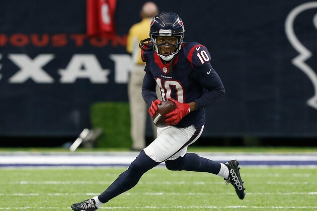 HOUSTON, TX - JANUARY 07:  DeAndre Hopkins #10 of the Houston Texans runs after catching a pass during the first half of the AFC Wild Card game against the Oakland Raiders at NRG Stadium on January 7, 2017 in Houston, Texas.  (Photo by Bob Levey/Getty Images)