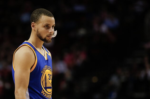 HOUSTON, TX - JANUARY 20:  Stephen Curry #30 of the Golden State Warriors looks on during a break in play against the Houston Rockets at Toyota Center on January 20, 2017 in Houston, Texas.  NOTE TO USER: User expressly acknowledges and agrees that, by downloading and/or using this photograph, user is consenting to the terms and conditions of the Getty Images License Agreement.  (Photo by Bob Levey/Getty Images)