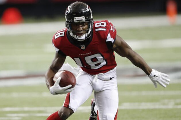 FILE - In this Nov. 27, 2016, file photo, Atlanta Falcons wide receiver Taylor Gabriel (18) runs against the Arizona Cardinals during the second of an NFL football game,  in Atlanta. The emergence of wide receiver Taylor Gabriel and the return of running back Tevin Coleman from an injury have given quarterback Matt Ryan more options to keep the offense moving _ and less dependent on Julio Jones and Devonta Freeman _ as the Falcons prepare to play Kansas City. (AP Photo/John Bazemore, File)