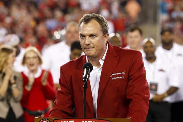 TAMPA, FL - NOVEMBER 3: Former Safety John Lynch of the Tampa Bay Buccaneers address the fans during his induction in the team's Ring of Honor during half-time of the game against the Atlanta Falcons at Raymond James Stadium on November 3, 2016 in Tampa, Florida. Lynch was played with the Buccaneers from 1993 to 2003. The Falcons defeated the Buccaneers 43 to 28. (Photo by Don Juan Moore/Getty Images)