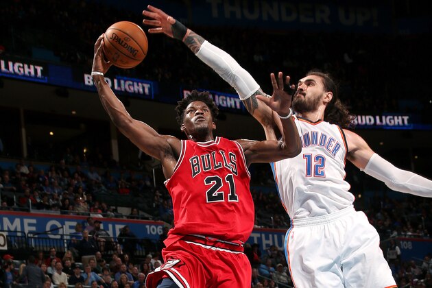 OKLAHOMA CITY, OK- FEBRUARY 1: Jimmy Butler #21 of the Chicago Bulls goes for the lay up during the game against the Oklahoma City Thunder on February 1, 2017 at Chesapeake Energy Arena in Oklahoma City, Oklahoma. NOTE TO USER: User expressly acknowledges and agrees that, by downloading and or using this photograph, User is consenting to the terms and conditions of the Getty Images License Agreement. Mandatory Copyright Notice: Copyright 2017 NBAE (Photo by Layne Murdoch/NBAE via Getty Images)
