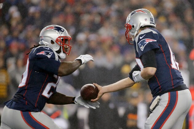 FOXBORO, MA - JANUARY 22:  Tom Brady #12 of the New England Patriots hands the ball off to LeGarrette Blount #29 during the first half against the Pittsburgh Steelers in the AFC Championship Game at Gillette Stadium on January 22, 2017 in Foxboro, Massachusetts.  (Photo by Jim Rogash/Getty Images)