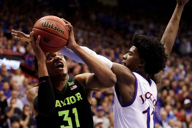 LAWRENCE, KS - FEBRUARY 01:  Terry Maston #31 of the Baylor Bears shoots as Josh Jackson #11 of the Kansas Jayhawks defends during the game at Allen Fieldhouse on February 1, 2017 in Lawrence, Kansas.  (Photo by Jamie Squire/Getty Images)