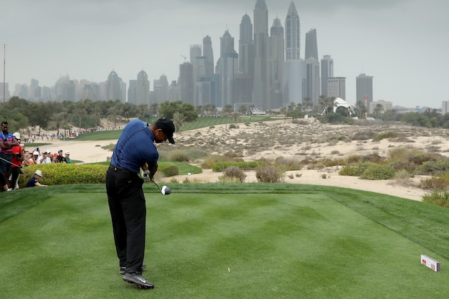 DUBAI, UNITED ARAB EMIRATES - FEBRUARY 02:  Tiger Woods of the United States plays his tee shot to the par 4, eighth hole during the first round of the 2017 Omega Dubai Desert Classic on the Majlis Course at the Emirates Golf Club at Emirates Golf Club on February 2, 2017 in Dubai, United Arab Emirates.  (Photo by David Cannon/Getty Images)