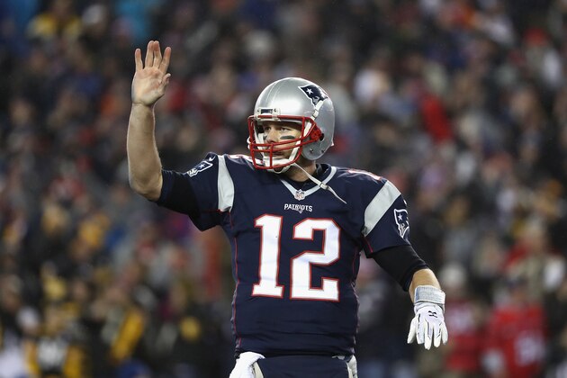 FOXBORO, MA - JANUARY 22:  Tom Brady #12 of the New England Patriots reacts against the Pittsburgh Steelers in the AFC Championship Game at Gillette Stadium on January 22, 2017 in Foxboro, Massachusetts.  (Photo by Elsa/Getty Images)