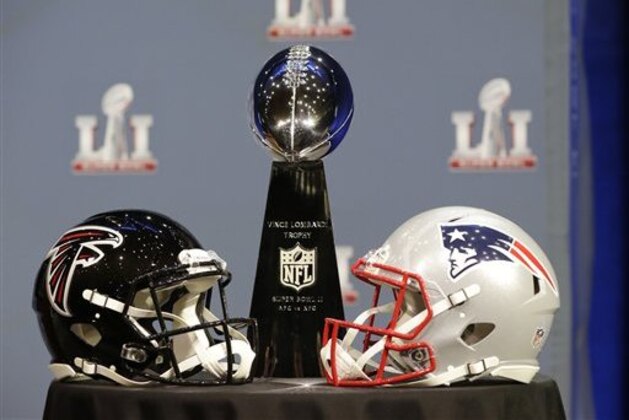 The Vince Lombardi Trophy is seen before NFL Commissioner Roger Goodell's news conference during preparations for the NFL Super Bowl 51 football game Wednesday, Feb. 1, 2017, in Houston. (AP Photo/David J. Phillip)