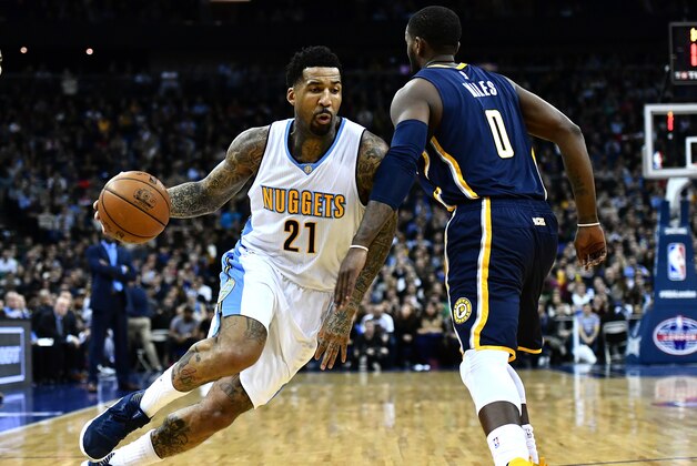 LONDON, ENGLAND - JANUARY 12: C.J. Miles #0 of the Indiana Pacers closes down Wilson Chandler #21 of the Denver Nuggets during the NBA match between Indiana Pacers and Denver Nuggets at the O2 Arena on January 12, 2017 in London, England.  (Photo by Dan Mullan/Getty Images)