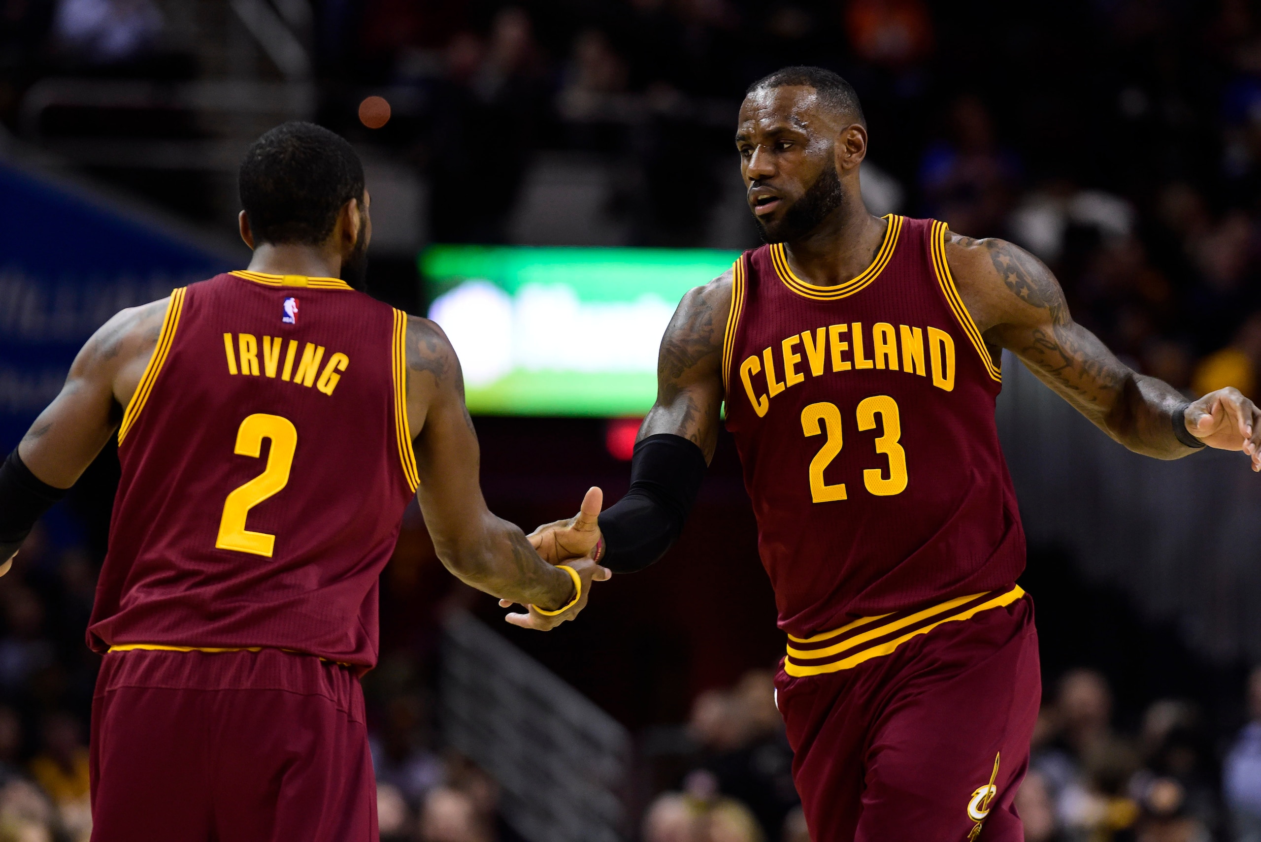 CLEVELAND, OH - FEBRUARY 1: Kyrie Irving #2 celebrates with LeBron James #23 of the Cleveland Cavaliers after LeBron scored during the first half against the Minnesota Timberwolves at Quicken Loans Arena on February 1, 2017 in Cleveland, Ohio. NOTE TO USER: User expressly acknowledges and agrees that, by downloading and/or using this photograph, user is consenting to the terms and conditions of the Getty Images License Agreement. Mandatory copyright notice. (Photo by Jason Miller/Getty Images)