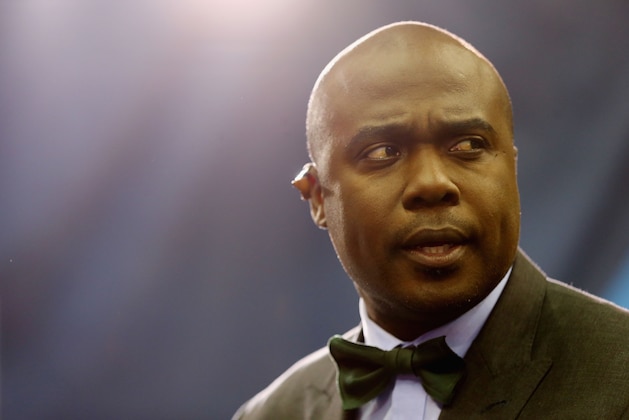 NEWARK, NJ - JANUARY 28:  Former NFL player Marshall Faulk looks on during Super Bowl XLVIII Media Day at the Prudential Center on January 28, 2014 in Newark, New Jersey.  Super Bowl XLVIII will be played between the Seattle Seahawks and the Denver Broncos on February 2.  (Photo by Elsa/Getty Images)