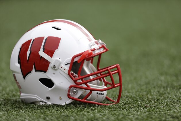 MILWAUKEE, WI - AUGUST 31: A Wisconsin Badgers football helmet sits on the field before the game between the UMass Minutemen and the Wisconsin Badgers at Camp Randall Stadium on August 31, 2013 in Madison, Wisconsin. (Photo by Mike McGinnis/Getty Images)