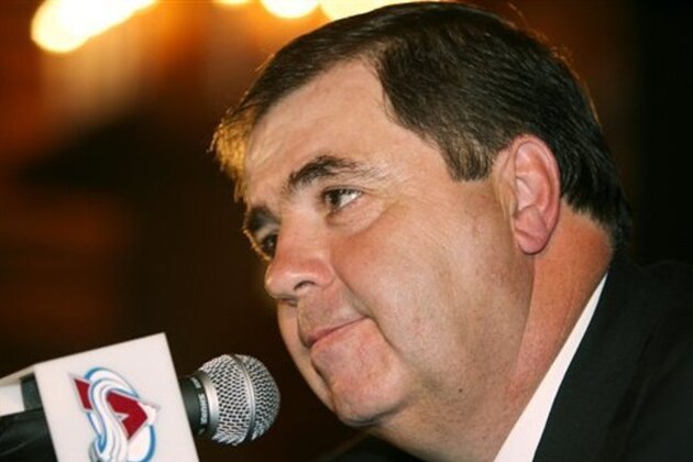 Pierre Lacroix talks about stepping down from his post as general manager and remaining as president of the Colorado Avalanche, during a news conference Friday, May 12, 2006, in Denver. (AP Photo/David Zalubowski)