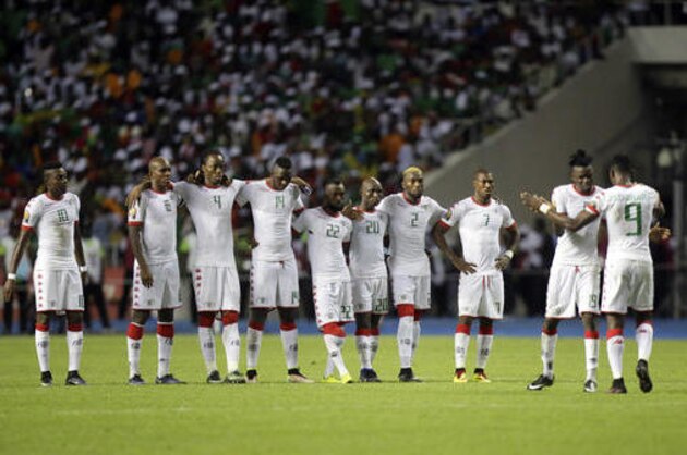 Burkina Faso players stand together during a penalty shoot out at the end of the African Cup of Nations semifinal soccer match between Burkina Faso and Egypt at the Stade de l'Amitie, in Libreville, Gabon, Wednesday, Feb. 1, 2017. Egypt defeated Burkins Faso 4-3 in a penalty shoot out after the game ended tied 1-1. (AP Photo/Sunday Alamba)