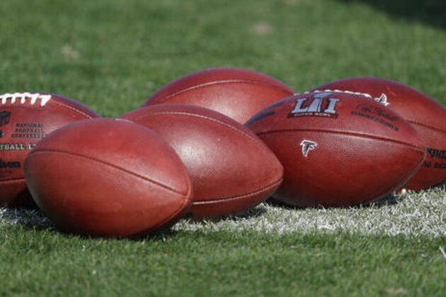 Footballs with the Super Bowl LI log are seen during a practice for the NFL Super Bowl 51 football game Thursday, Feb. 2, 2017, in Houston. Atlanta will face the New England Patriots in the Super Bowl Sunday. (AP Photo/Eric Gay)