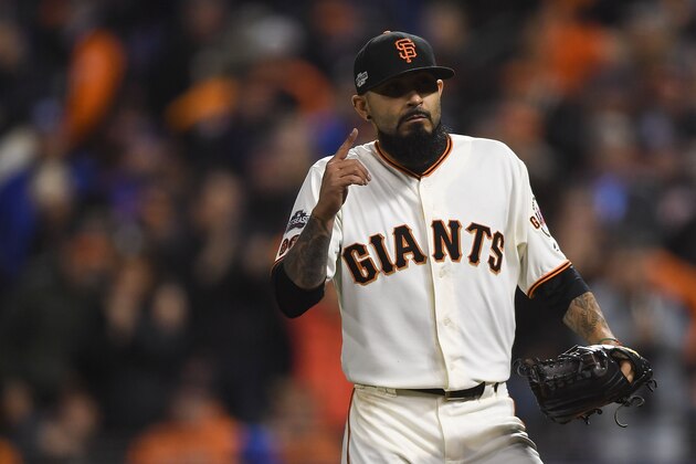 SAN FRANCISCO, CA - OCTOBER 10:  Sergio Romo #54 of the San Francisco Giants reacts in the tenth inning against the Chicago Cubs during Game Three of their National League Division Series against the Chicago Cubs at AT&T Park on October 10, 2016 in San Francisco, California.  (Photo by Thearon W. Henderson/Getty Images)