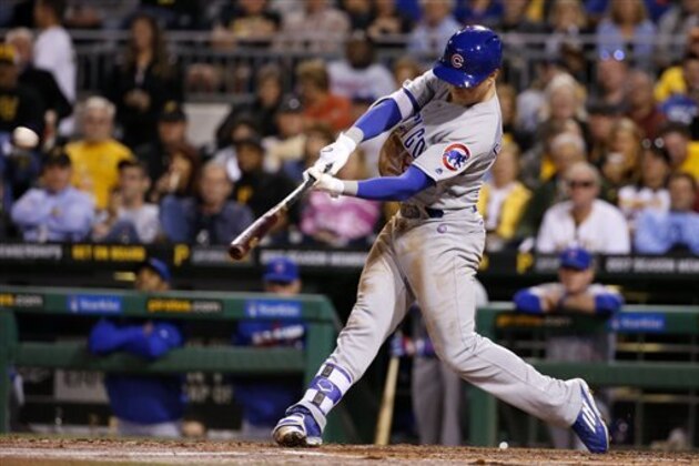 Chicago Cubs' Chris Coghlan drives in three runs with a bases loaded triple off Pittsburgh Pirates starting pitcher Ryan Vogelsong in the second inning of a baseball game in Pittsburgh, Tuesday, Sept. 27, 2016. (AP Photo/Gene J. Puskar)