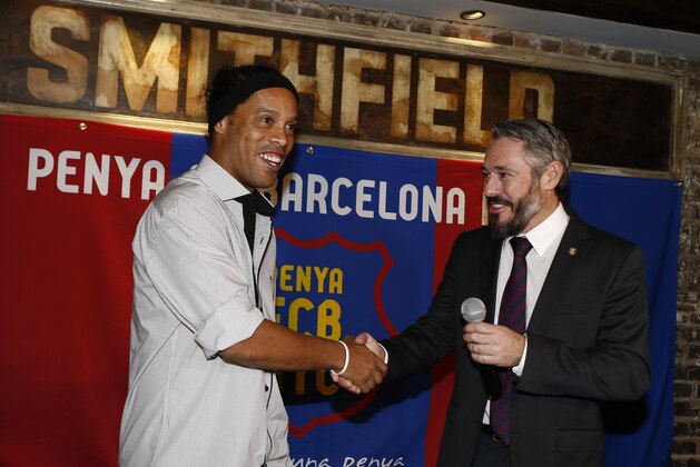 NEW YORK, NY - SEPTEMBER 07: Ronaldinho is greeted by Jordi Getman-Eraso, President of Penya FC Barcelona New York City at Smithfield Hall on September 7, 2016 in New York City. (Photo by Jeff Zelevansky/Getty Images for FC Barcelona)