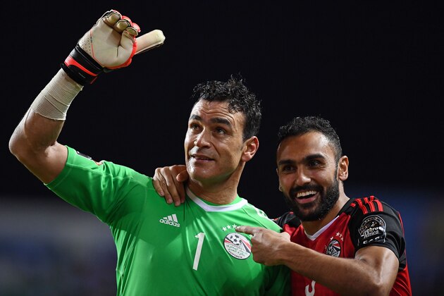 Egypt's goalkeeper Essam El-Hadary (L) and Egypt's midfielder Ahmed Elmohamady celebrate at the end of the penalty shootout of the 2017 Africa Cup of Nations semi-final football match between Burkina Faso and Egypt at the Stade de l'Amitie Sino-Gabonaise in Libreville on February 1, 2017. / AFP / GABRIEL BOUYS        (Photo credit should read GABRIEL BOUYS/AFP/Getty Images)