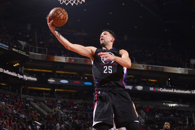 PHOENIX, AZ - FEBRUARY 1: Austin Rivers #25 of the LA Clippers goes up for a lay up against the Phoenix Suns on February 1, 2017 at Talking Stick Resort Arena in Phoenix, Arizona. NOTE TO USER: User expressly acknowledges and agrees that, by downloading and or using this photograph, user is consenting to the terms and conditions of the Getty Images License Agreement. Mandatory Copyright Notice: Copyright 2017 NBAE (Photo by Barry Gossage/NBAE via Getty Images)