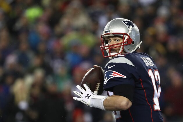 FOXBORO, MA - JANUARY 22:  Tom Brady #12 of the New England Patriots looks to pass the ball against the Pittsburgh Steelers in the AFC Championship Game at Gillette Stadium on January 22, 2017 in Foxboro, Massachusetts.  (Photo by Elsa/Getty Images)
