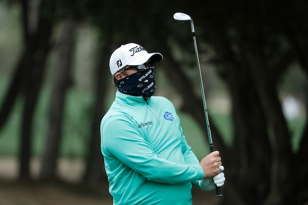 DUBAI, UNITED ARAB EMIRATES - FEBRUARY 03:  George Coetzee of South Africa hits his second shot on the 14th hole during the second round of the Omega Dubai Desert Classic at Emirates Golf Club on February 3, 2017 in Dubai, United Arab Emirates.  (Photo by Francois Nel/Getty Images)