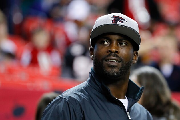 ATLANTA, GA - JANUARY 01: Former Atlanta Falcons player Michael Vick walks on the field prior to the game against the New Orleans Saints at the Georgia Dome on January 1, 2017 in Atlanta, Georgia. (Photo by Kevin C.  Cox/Getty Images)