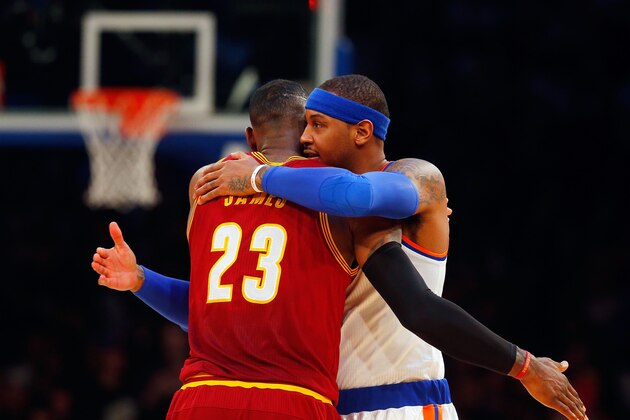 NEW YORK, NY - DECEMBER 07:  (NEW YORK DAILIES OUT)    Carmelo Anthony #7 of the New York Knicks greets LeBron James #23 of the Cleveland Cavaliers before their game at Madison Square Garden on December 7, 2016 in New York City. The Cavaliers defeated the Knicks 126-94.  NOTE TO USER: User expressly acknowledges and agrees that, by downloading and/or using this Photograph, user is consenting to the terms and conditions of the Getty Images License Agreement.  (Photo by Jim McIsaac/Getty Images)