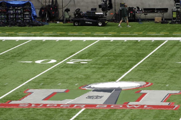 The field at NRG Stadium is prepared for the NFL Super Bowl 51 football game Tuesday, Jan. 31, 2017, in Houston. The New England Patriots will play the Atlanta Falcons in Super Bowl 51 Sunday, Feb. 5, 2017. (AP Photo/David J. Phillip)