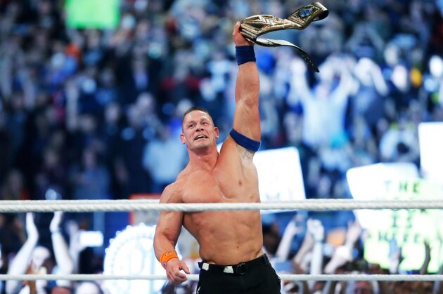John Cena celebrating his historic title win.