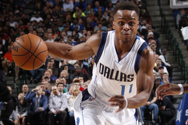 DALLAS, TX - JANUARY 30: Yogi Ferrell #11 of the Dallas Mavericks handles the ball against the Cleveland Cavaliers on January 30, 2017 at the American Airlines Center in Dallas, Texas. NOTE TO USER: User expressly acknowledges and agrees that, by downloading and or using this photograph, User is consenting to the terms and conditions of the Getty Images License Agreement. Mandatory Copyright Notice: Copyright 2017 NBAE (Photo by Glenn James/NBAE via Getty Images)