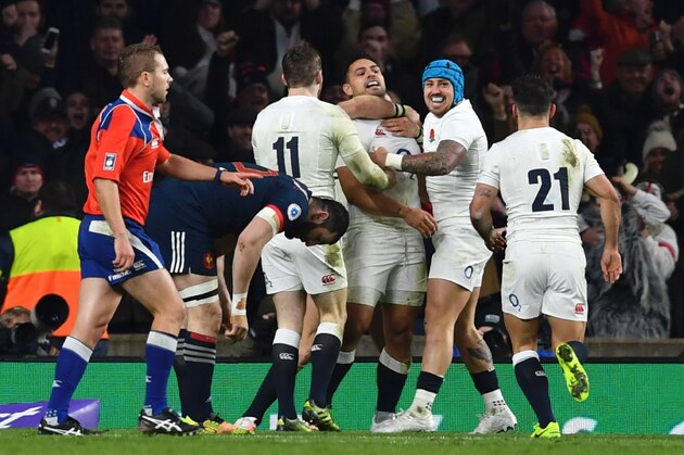 England's Danny Care (3rd R) celebrates with teammates after scoring England's first try during the Six Nations international rugby union match between England and France at Twickenham stadium in southwest London on February 4, 2017. / AFP / Ben STANSALL        (Photo credit should read BEN STANSALL/AFP/Getty Images)