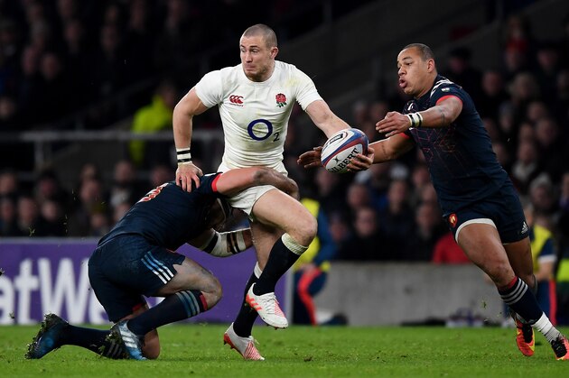 LONDON, ENGLAND - FEBRUARY 04: Mike Brown of England os tackled during the RBS Six Nations match between England and France at Twickenham Stadium on February 4, 2017 in London, England.  (Photo by Laurence Griffiths/Getty Images)