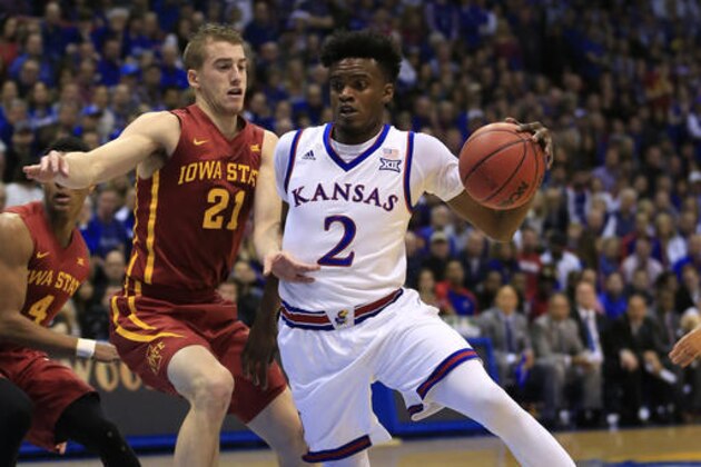 Kansas guard Lagerald Vick (2) drives on Iowa State guard Matt Thomas (21) during the first half of an NCAA college basketball game in Lawrence, Kan., Saturday, Feb. 4, 2017. (AP Photo/Orlin Wagner) Kansas guard Lagerald Vick (2) drives on Iowa State guard Matt Thomas (21) during the first half of an NCAA college basketball game in Lawrence, Kan., Saturday, Feb. 4, 2017. (AP Photo/Orlin Wagner)