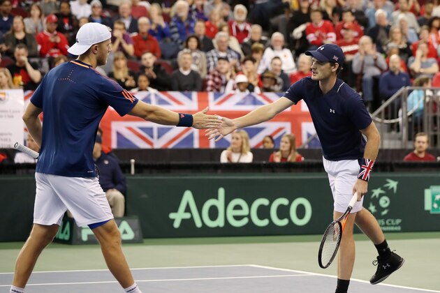 Jamie Murray and Dominic Inglot Great Britain win a point against Daniel Nestor and Vasek Pospisil of Canada during the doubles match of the second day of Davis Cup first round play between Canada and Great Britain at TD Place in Ottawa, Ontario, February 4, 2017.  / AFP / Lars Hagberg        (Photo credit should read LARS HAGBERG/AFP/Getty Images)