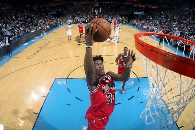 OKLAHOMA CITY, OK- FEBRUARY 1: Jimmy Butler #21 of the Chicago Bulls goes for the dunk during the game against the Oklahoma City Thunder on February 1, 2017 at Chesapeake Energy Arena in Oklahoma City, Oklahoma. NOTE TO USER: User expressly acknowledges and agrees that, by downloading and or using this photograph, User is consenting to the terms and conditions of the Getty Images License Agreement. Mandatory Copyright Notice: Copyright 2017 NBAE (Photo by Layne Murdoch/NBAE via Getty Images)