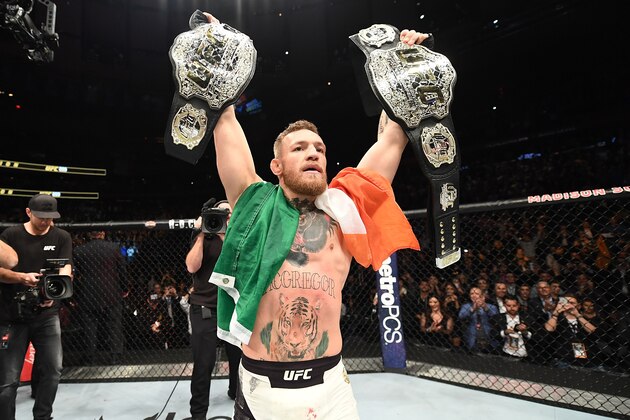 NEW YORK, NY - NOVEMBER 12:  UFC lightweight and featherweight champion Conor McGregor of Ireland celebrates after defeating Eddie Alvarez in their UFC lightweight championship fight during the UFC 205 event at Madison Square Garden on November 12, 2016 in New York City. (Photo by Jeff Bottari/Zuffa LLC/Zuffa LLC via Getty Images)