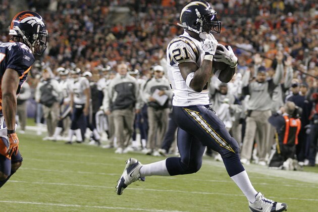 LaDainian Tomlinson (21) of the San Diego Chargers runs in for a touchdown during a game against the Denver Broncos at Invesco Field at Mile High Stadium, Denver,  Colorado, November 19, 2006. San Diego defeated Denver 35 to 27. (Photo by dee  Welsch/Getty Images)